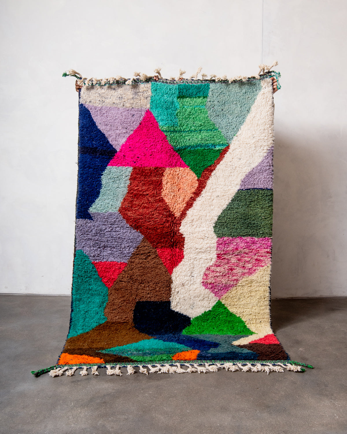 Modern, designer, handcrafted Berber rug from Morocco. Beniourain carpet with beautiful colours and patterns and fluffy wool texture.